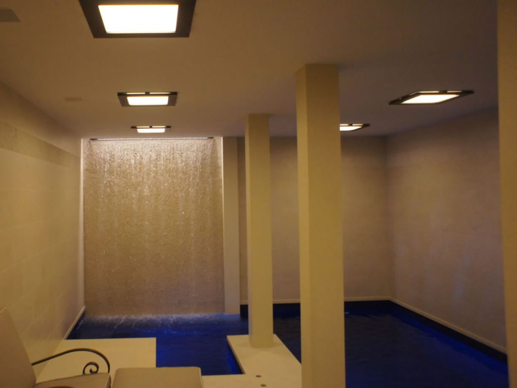 Indoor Pool with Rain Curtain Wall